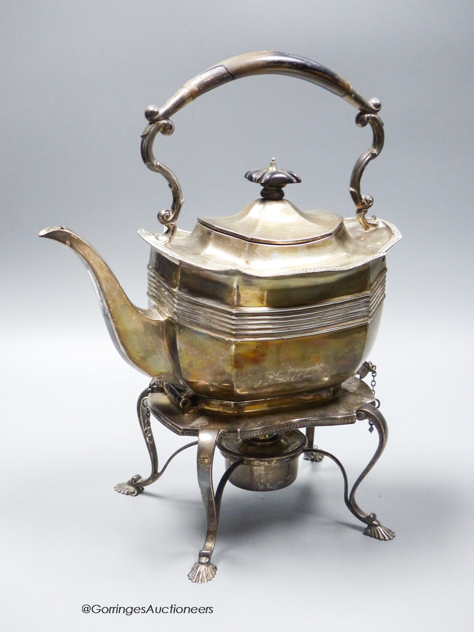 A late Victorian silver shaped rectangular tea kettle on stand with burner, Thomas Bradbury & Sons, London, 1896, overall height 32cm